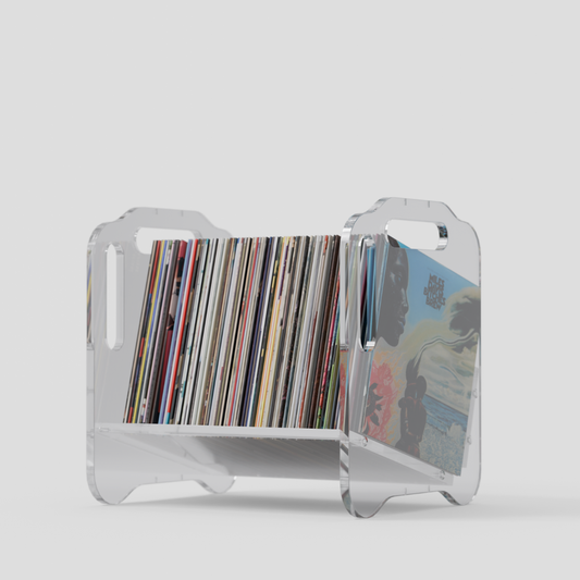 Transparent acrylic modular vinyl record storage unit displaying a collection of vinyl records.